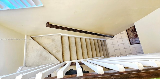 17352 SW 18th St, Miramar, FL 33029 - stairway featuring tile walls and vaulted ceiling