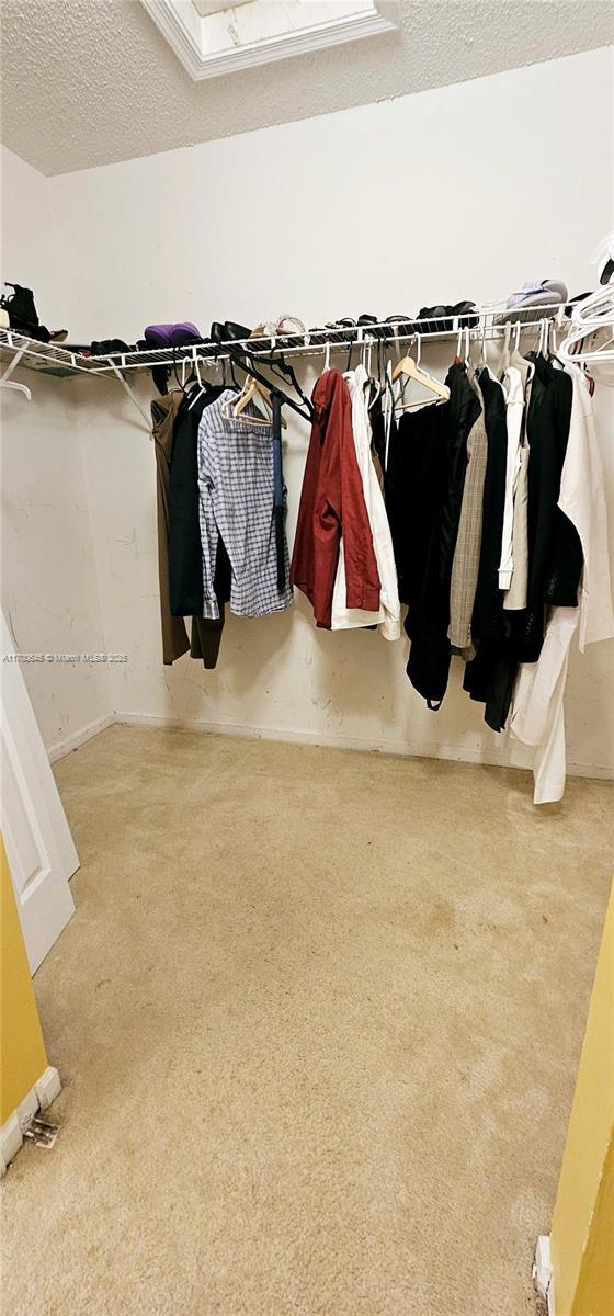 17352 SW 18th St, Miramar, FL 33029 - walk in closet featuring carpet