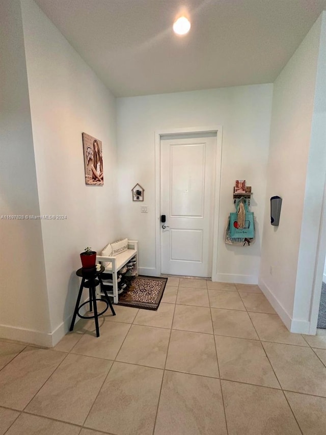 interior space featuring light tile patterned floors