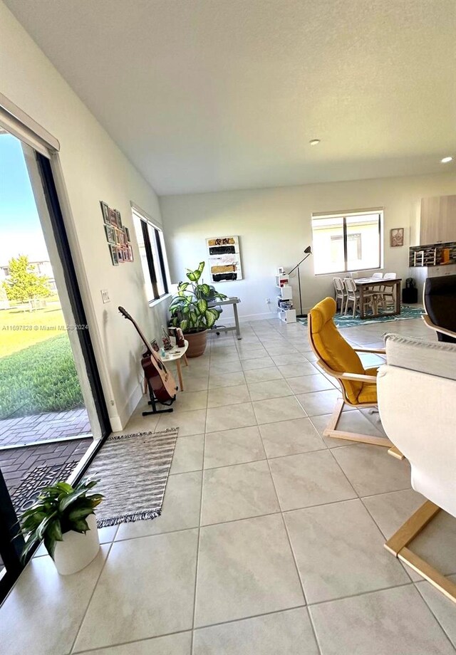 interior space featuring light tile patterned floors