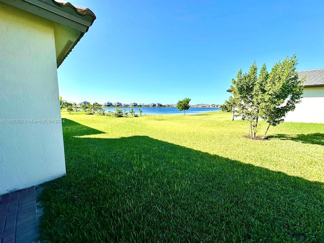 view of yard with a water view