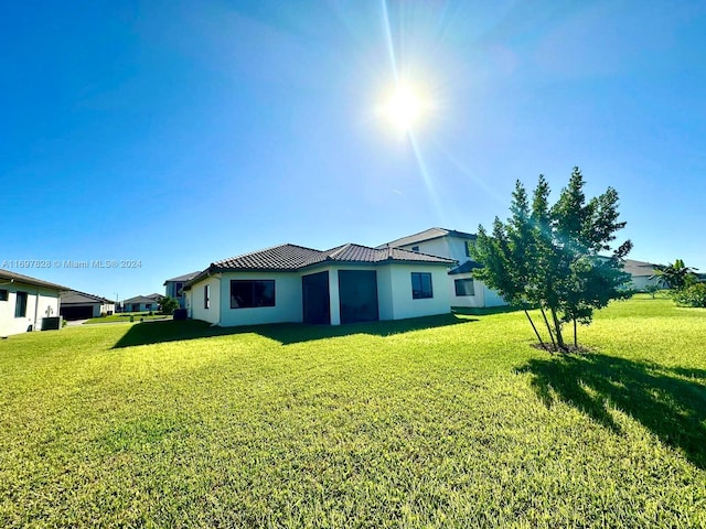 view of front of home with a front lawn