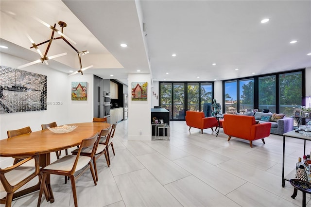 dining room featuring a wall of windows