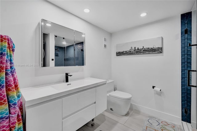 bathroom featuring walk in shower, vanity, and toilet