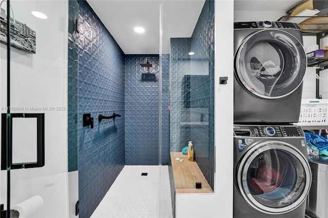 washroom featuring stacked washer and dryer