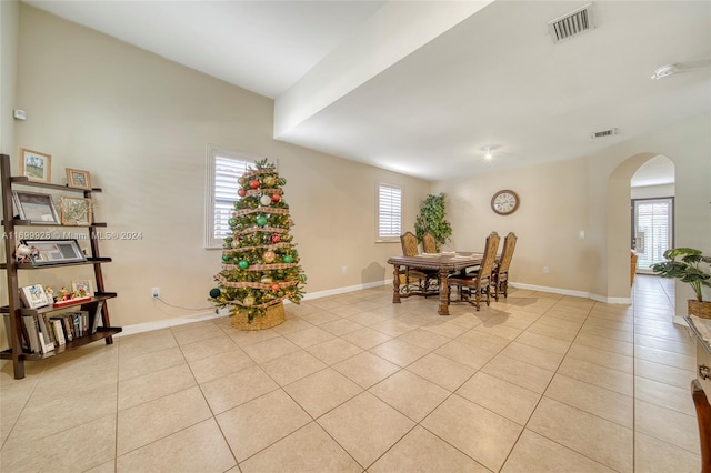 dining space with light tile patterned flooring