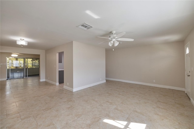 empty room featuring ceiling fan