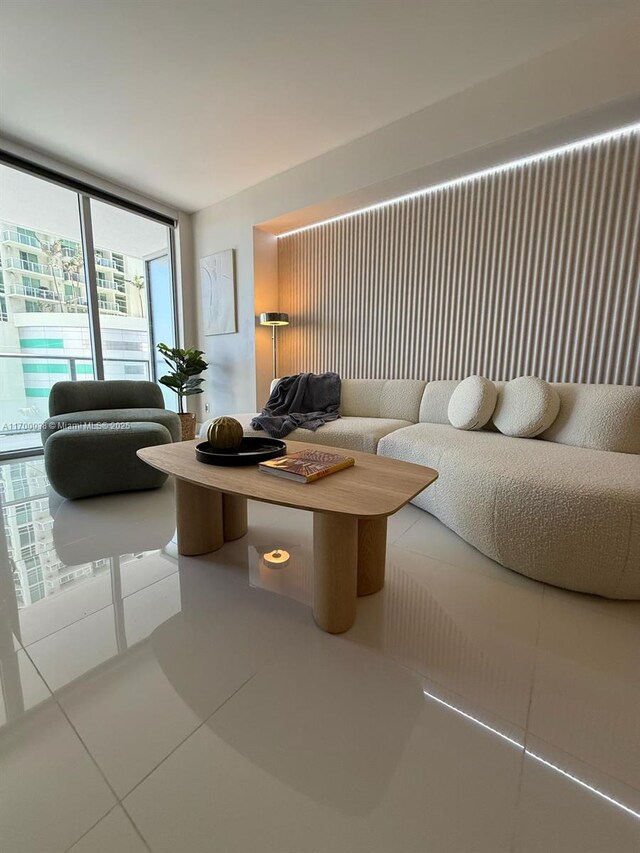 1300 Brickell Bay Dr Unit 604, Miami, FL 33131 - living room with tile patterned floors and floor to ceiling windows