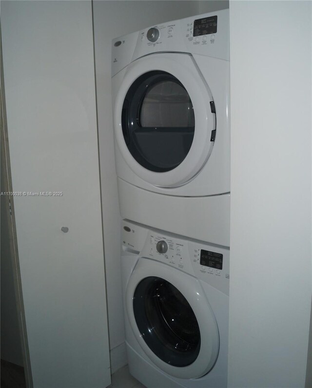 1300 Brickell Bay Dr Unit 604, Miami, FL 33131 - laundry area featuring estacked washer and dryer