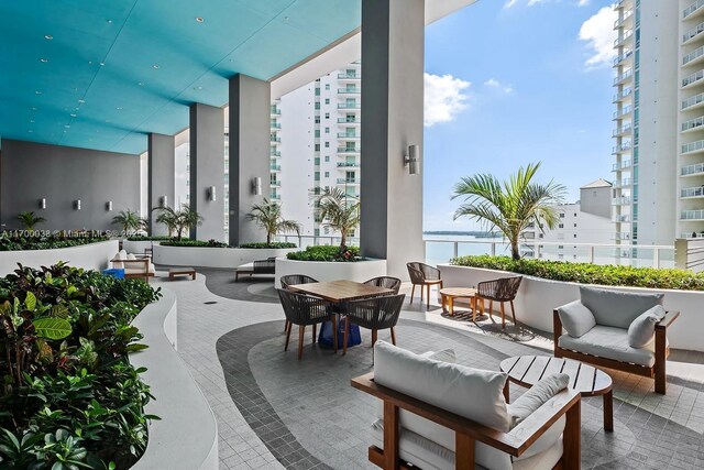1300 Brickell Bay Dr Unit 604, Miami, FL 33131 - view of patio / terrace featuring outdoor lounge area