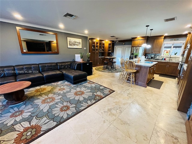 living room with ornamental molding