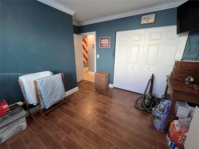 sitting room featuring dark hardwood / wood-style floors and ornamental molding