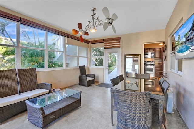 living room featuring ceiling fan