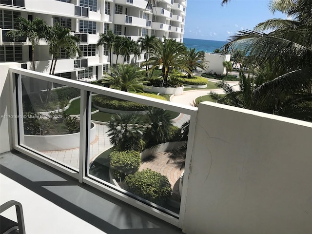 balcony featuring a water view