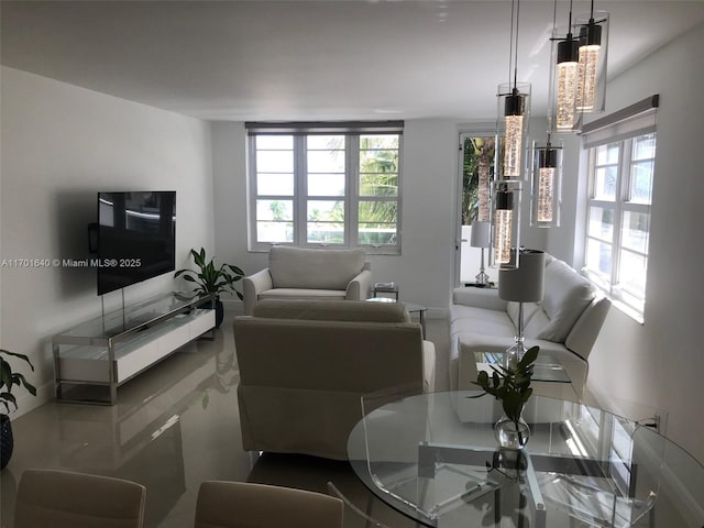 living room with concrete flooring