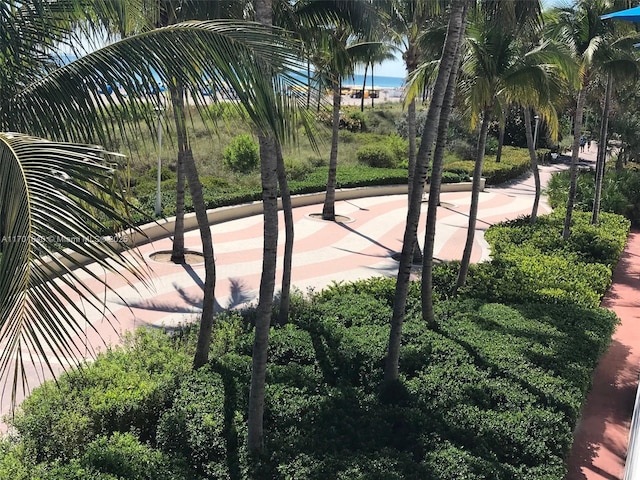 view of home's community with a water view