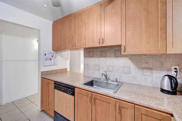 kitchen featuring decorative backsplash, dishwashing machine, ceiling fan, sink, and light brown cabinets