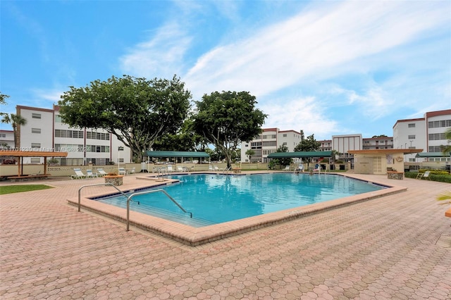 view of pool featuring a patio