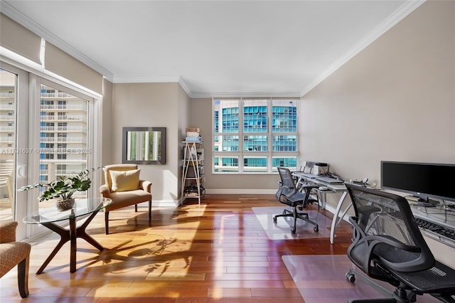 office featuring baseboards, crown molding, and wood finished floors