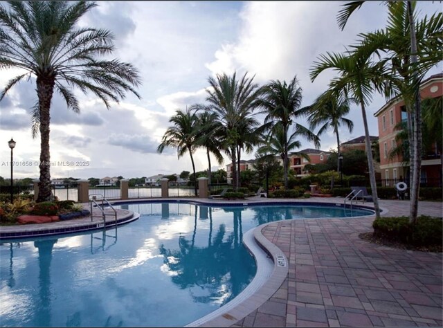 view of pool featuring a patio