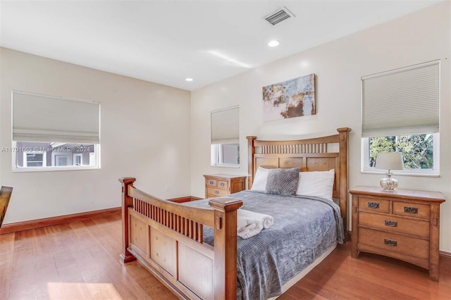 bedroom featuring light hardwood / wood-style flooring