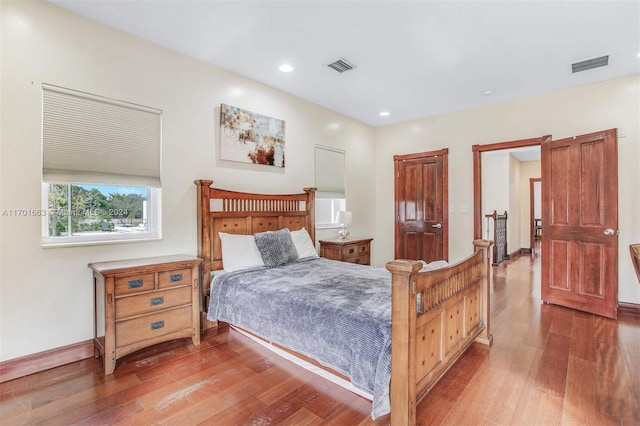 bedroom featuring wood-type flooring