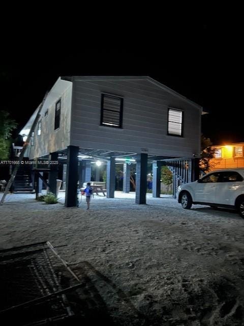 view of property exterior at night