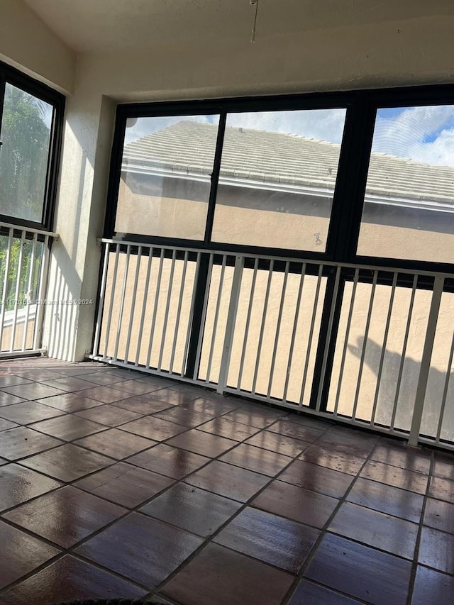 unfurnished sunroom with a healthy amount of sunlight