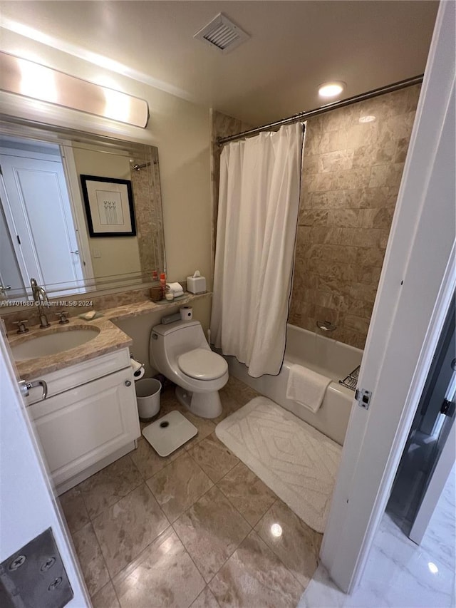 full bathroom featuring vanity, toilet, and shower / tub combo