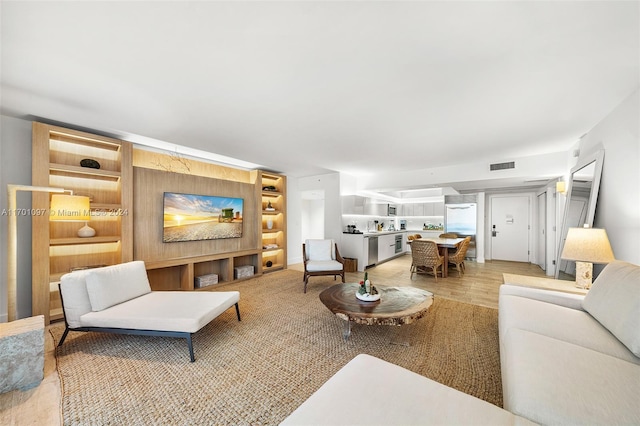 living room with hardwood / wood-style flooring