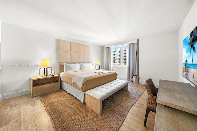 bedroom featuring light hardwood / wood-style floors