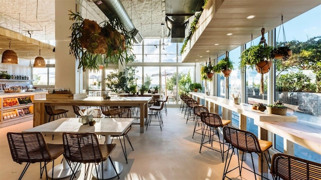 dining room with a high ceiling