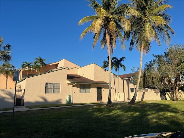 exterior space with a lawn