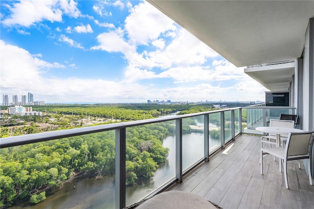 balcony featuring a water view