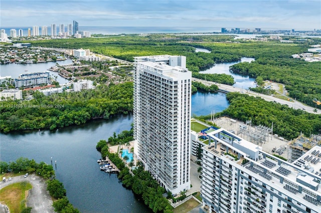 birds eye view of property featuring a water view