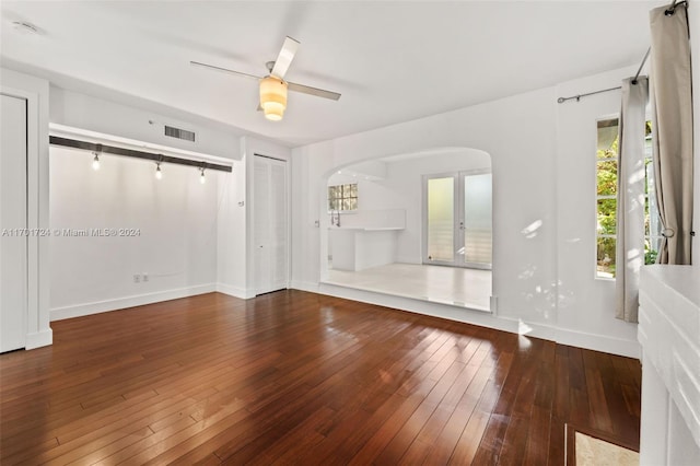 unfurnished room with hardwood / wood-style floors and ceiling fan