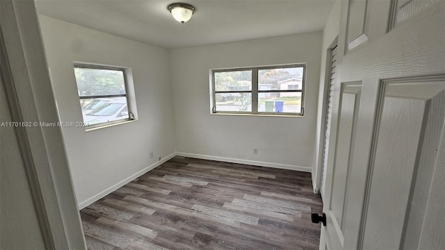 unfurnished room featuring hardwood / wood-style floors