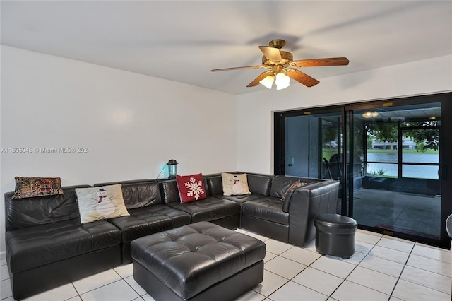 tiled living room featuring ceiling fan