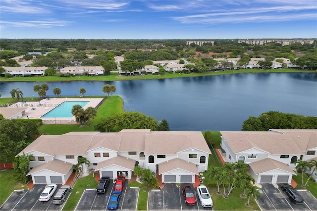 drone / aerial view with a water view