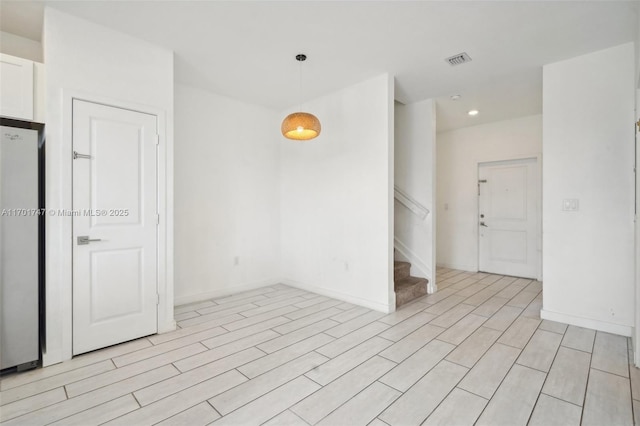 empty room featuring light hardwood / wood-style flooring