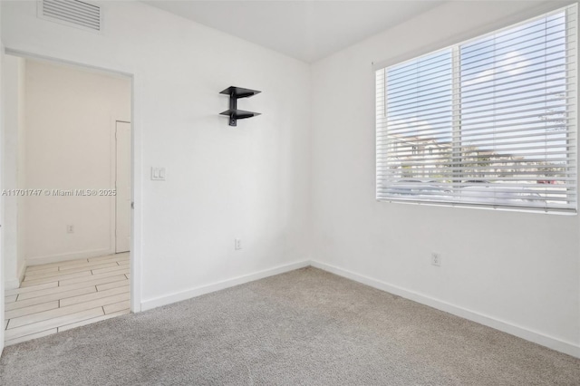 empty room featuring carpet