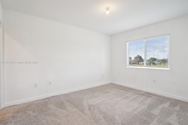 view of carpeted spare room