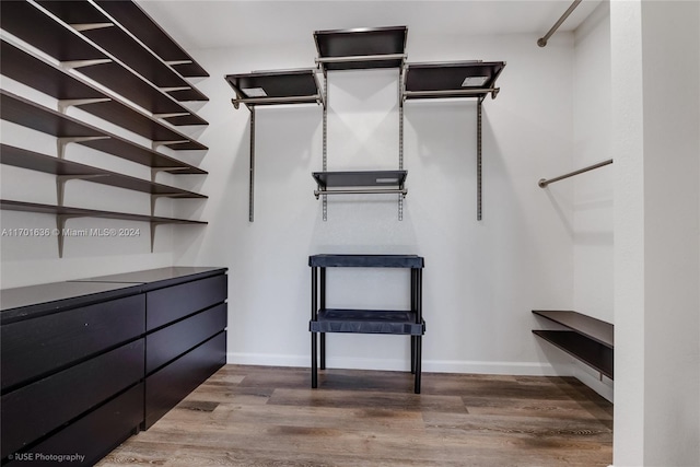 walk in closet featuring wood-type flooring