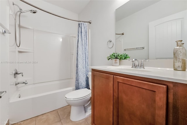 full bathroom with tile patterned floors, shower / bath combination with curtain, toilet, and vanity