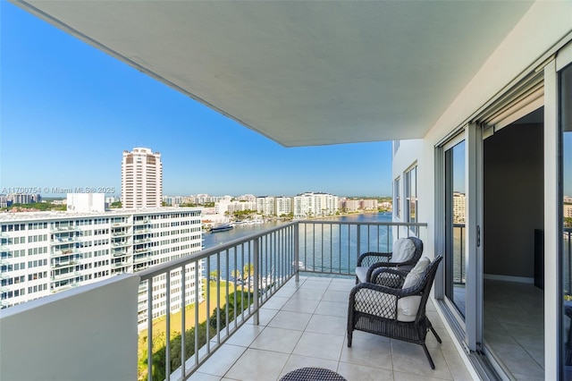 balcony featuring a water view