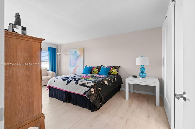 bedroom featuring light hardwood / wood-style floors