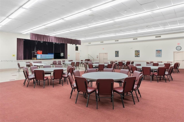 dining area with carpet