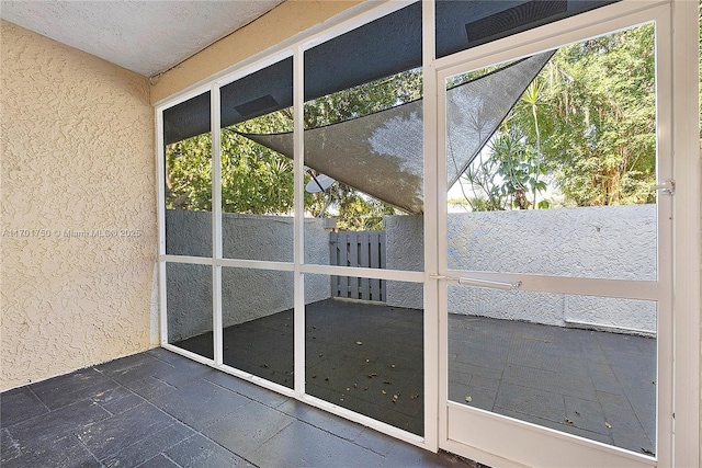 view of unfurnished sunroom