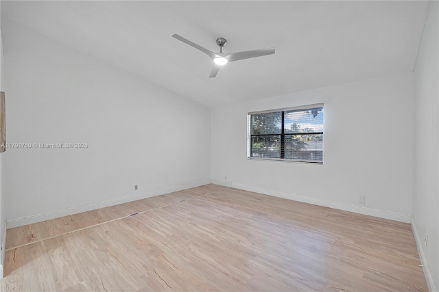 empty room with ceiling fan and light wood-type flooring