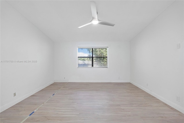 unfurnished room with ceiling fan and light wood-type flooring